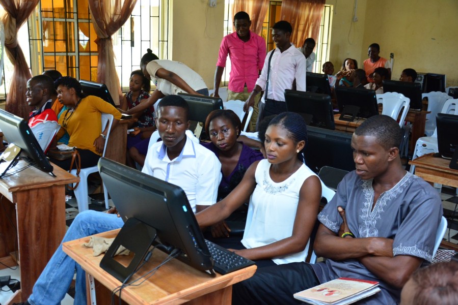Picture by Initiative for Development Education and Learning teaching a digital skill to student skills acquisition centre Delta state Government )